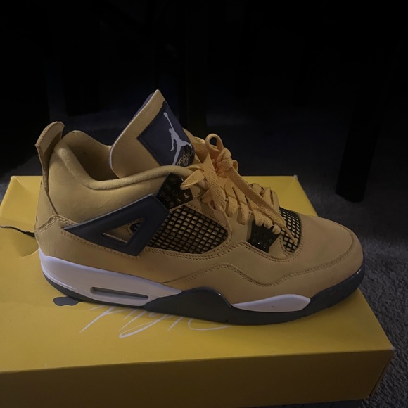 Size 12 jordan lighting 4s  worn once good condition